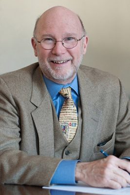 A portrait of professor-in-residence Thomas Long.